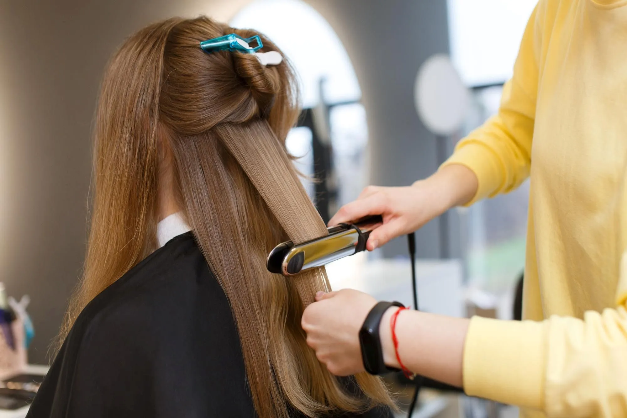 Well groomed hair straightening in process