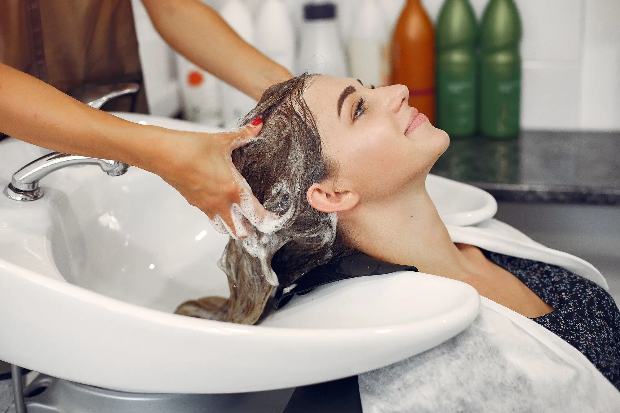 women washing head in a hair salon - best hair salon in Pokhara