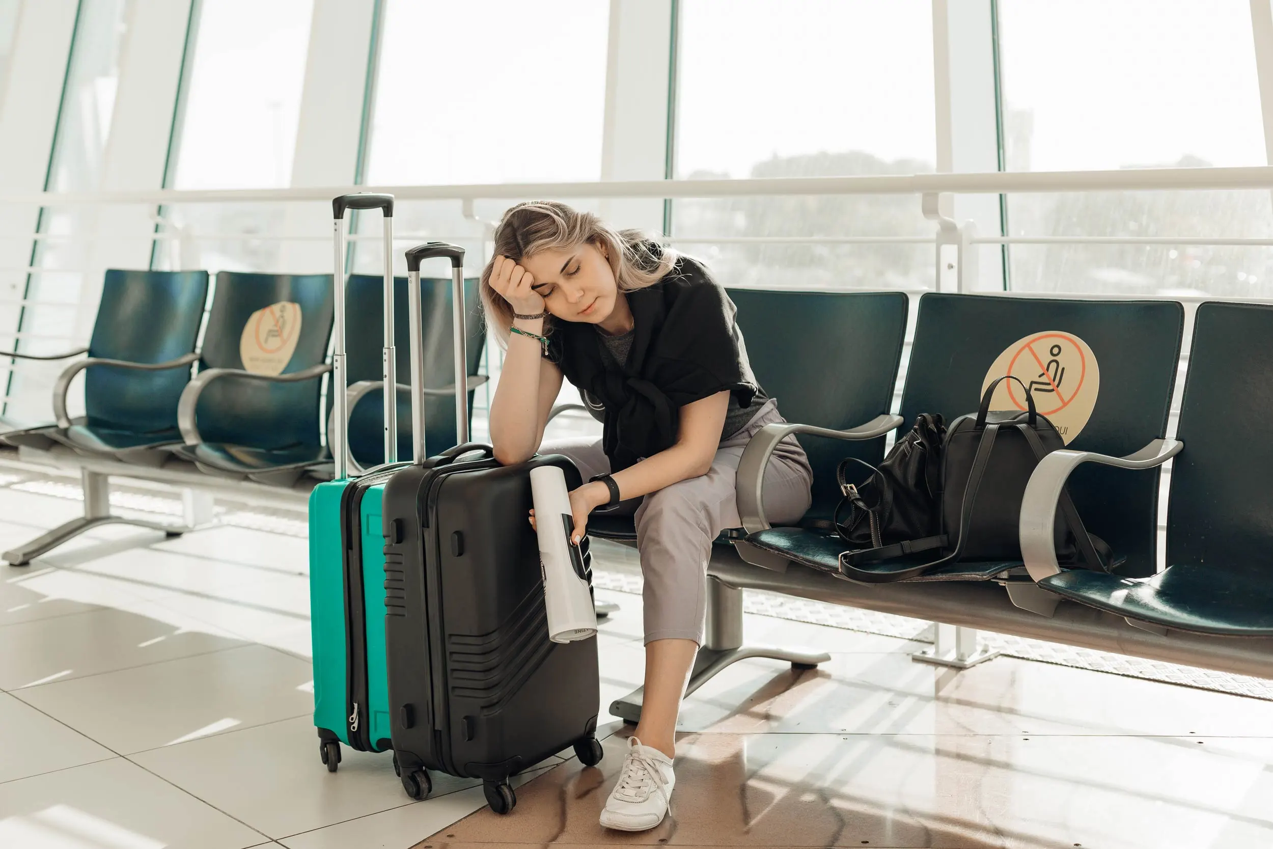 A man feeling tired after the flight in airport